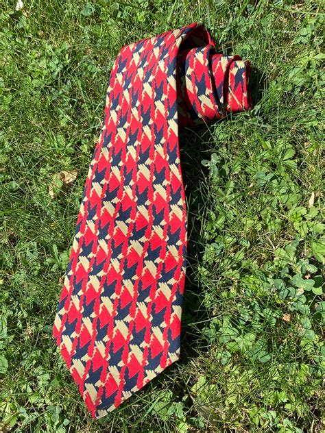 ysl tie with grapes